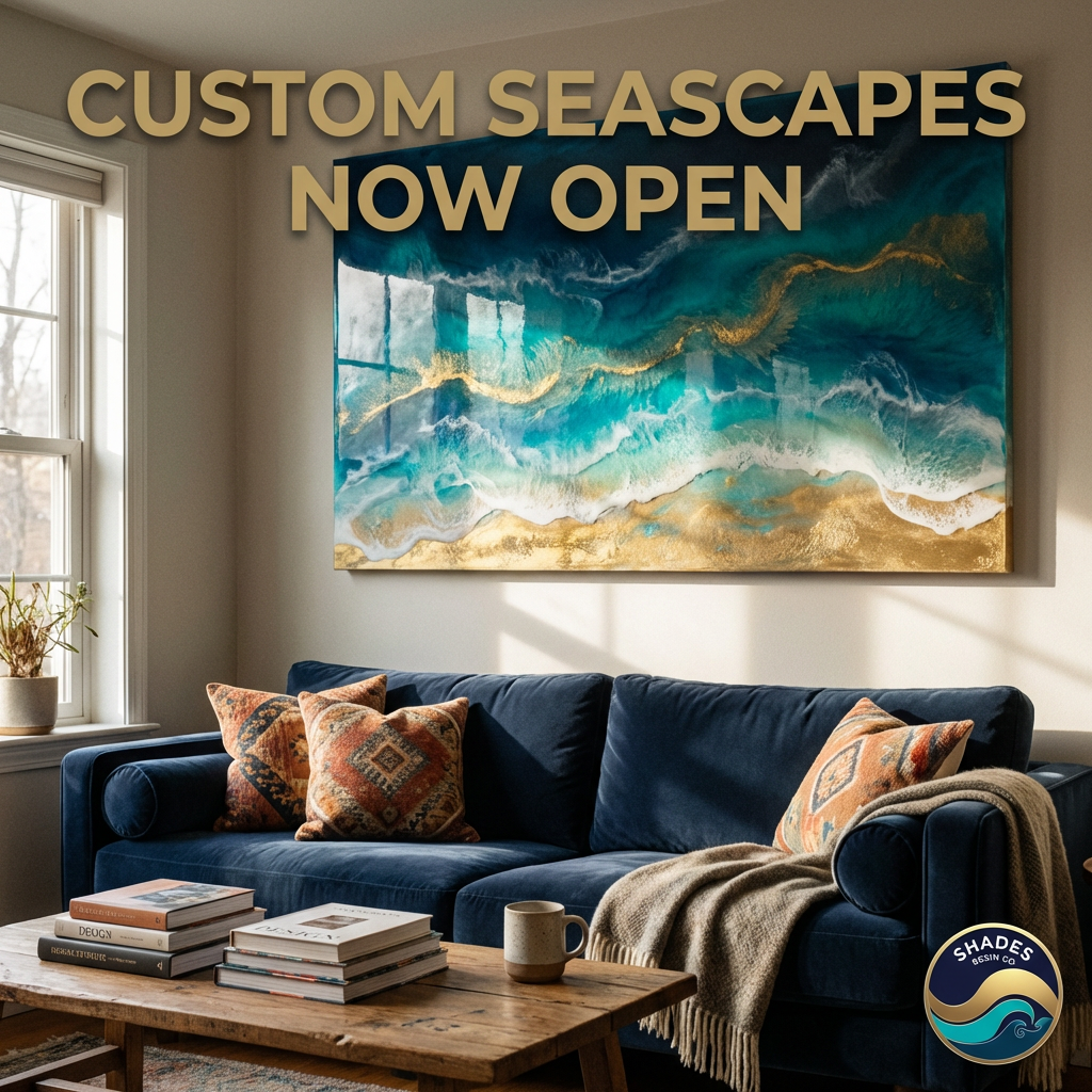 Living room with a blue sofa, wooden coffee table, and abstract painting of a seascape on the wall.